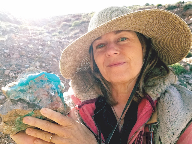 kalyani marsh holding a gemstone