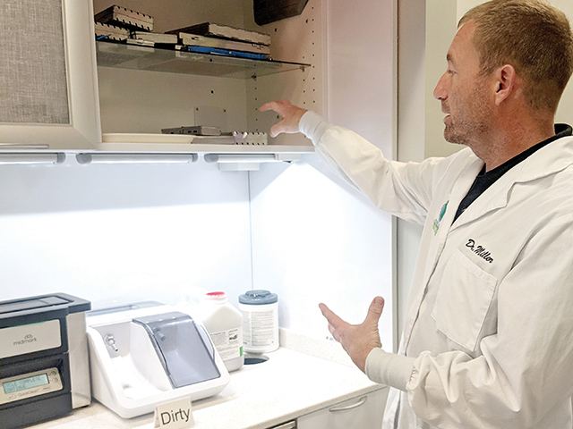 Dr. Joseph Miller in laboratory